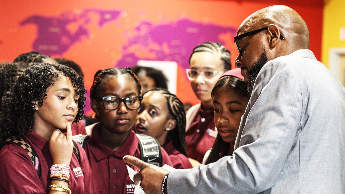Students at New Heights Charter Public School celebrating educational milestone in Brockton Massachusetts