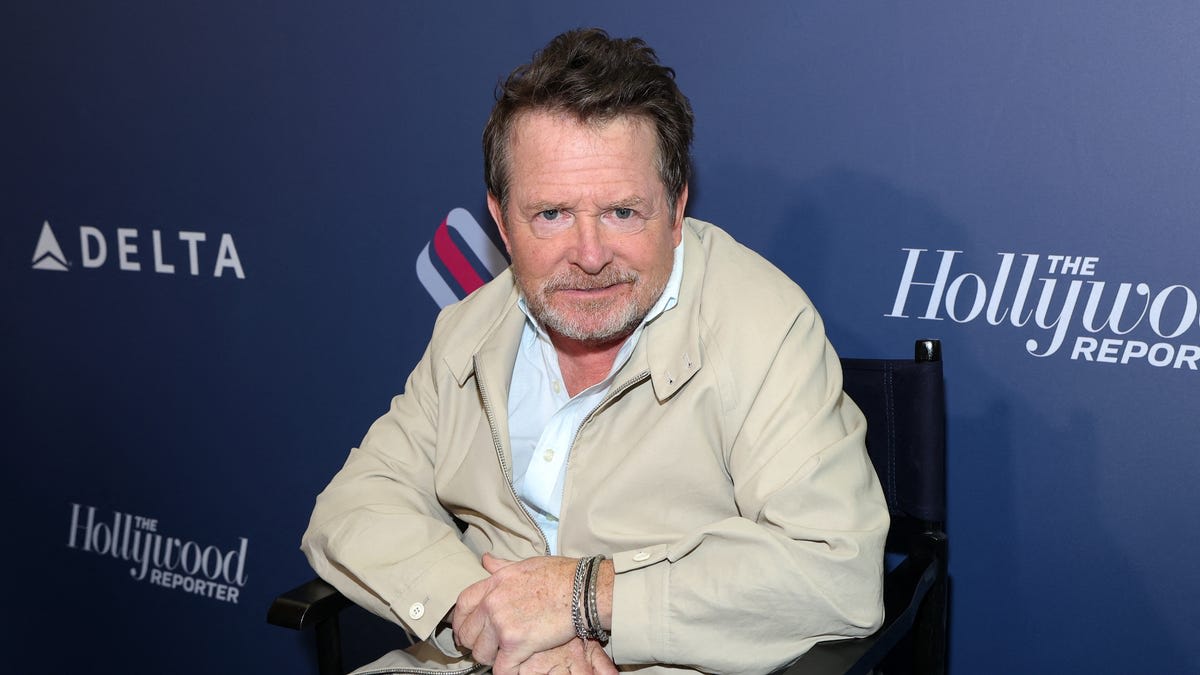 Michael J. Fox smiling at Emmy Awards podium accepting Bob Hope Humanitarian Award