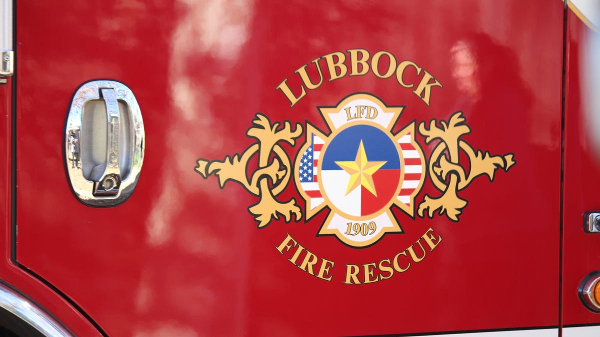 Lubbock Fire Rescue truck and firefighters responding to emergency call in Texas