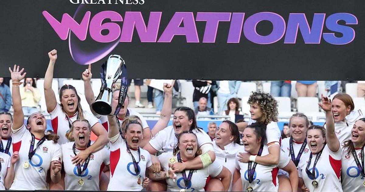 England Red Roses women's rugby team celebrating their World Cup championship victory together