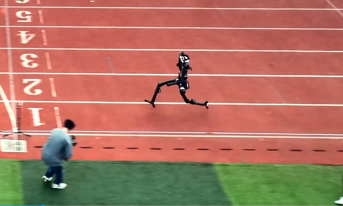 Unitree H1 humanoid robot sprinting on outdoor athletics track at high speed