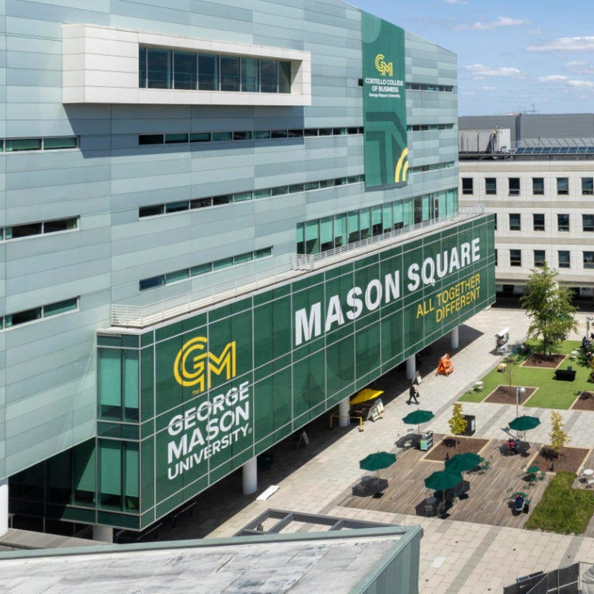 Ninth grade students working together in a robotics lab at George Mason University's ACCESS Academy