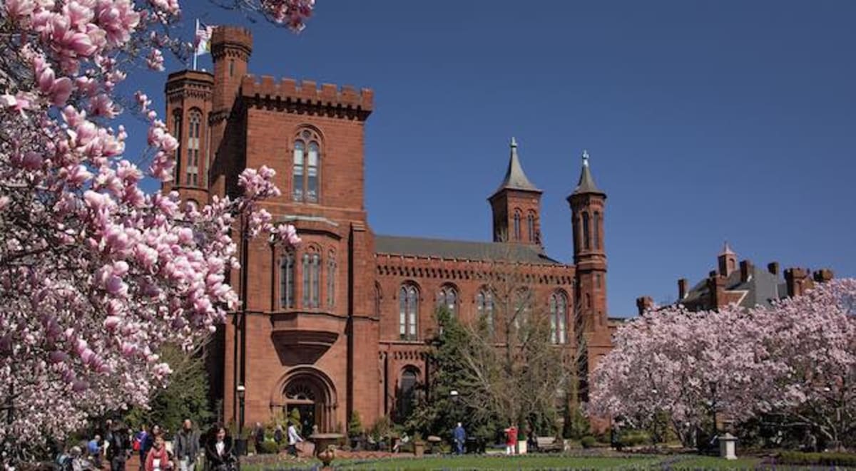 ** Historic Smithsonian Castle building on National Mall in Washington DC with red sandstone towers