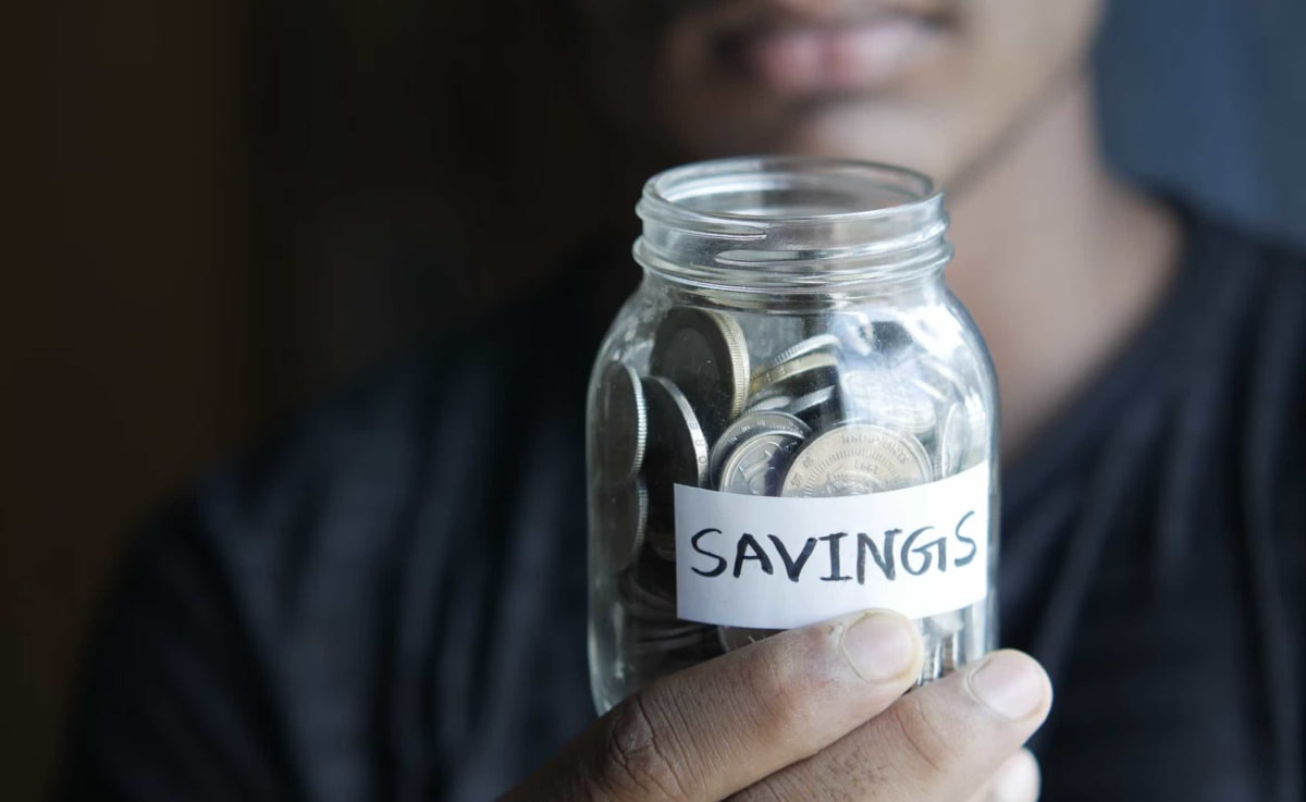 High school students learning about money management and financial planning in classroom setting