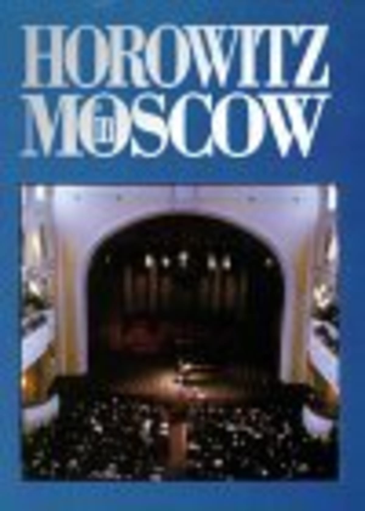 ** Elderly pianist Vladimir Horowitz performing at grand piano during historic Moscow concert