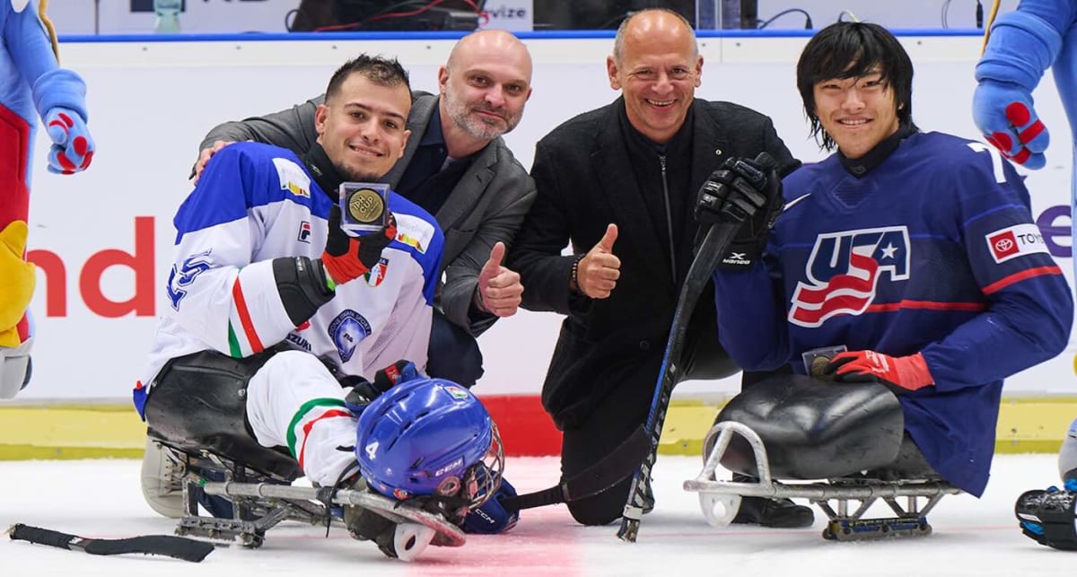 Kayden Beasley in USA sled hockey uniform competing at 2026 Paralympics in Italy