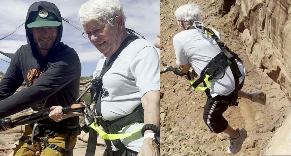 78-year-old Barbara swinging across canyon on rope swing between red rock cliffs in Moab Utah