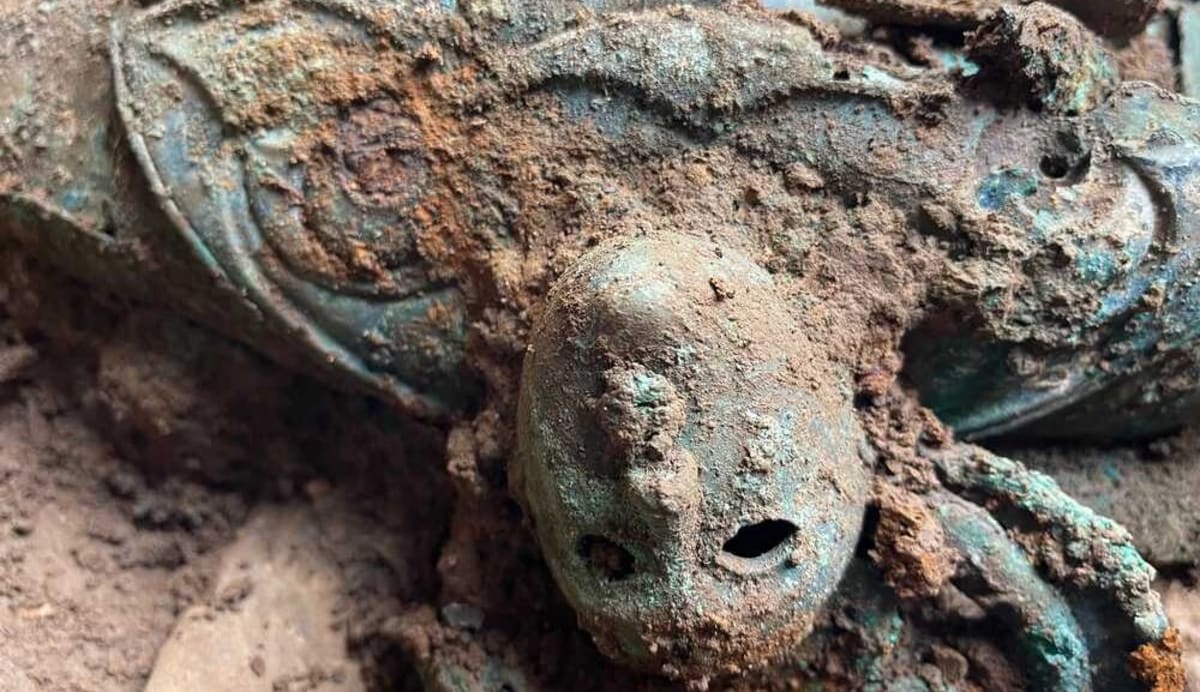 Ancient iron wagon tire bands and horse tackle artifacts stacked together from Melsonby Hoard discovery