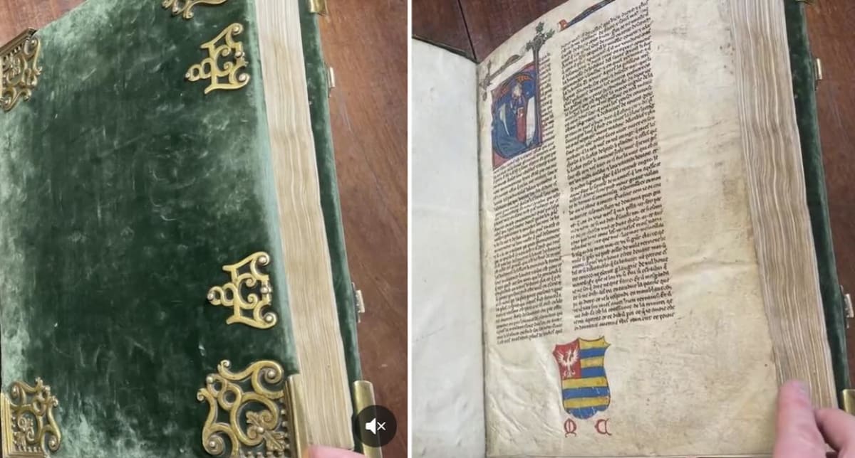 Medieval manuscript page showing gold-embossed illustration of King Arthur and knights from 750-year-old Lebaudy Manuscript