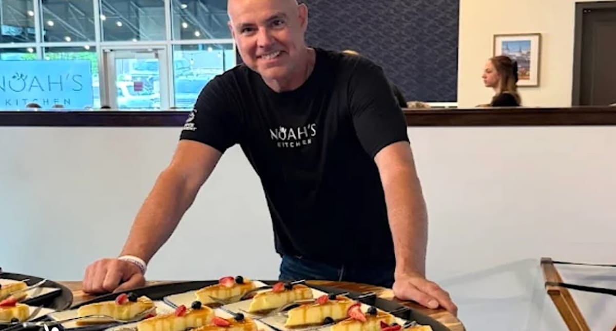 Adam Ursprung, owner of Noah's Kitchen charitable restaurant in Louisville, Kentucky smiling