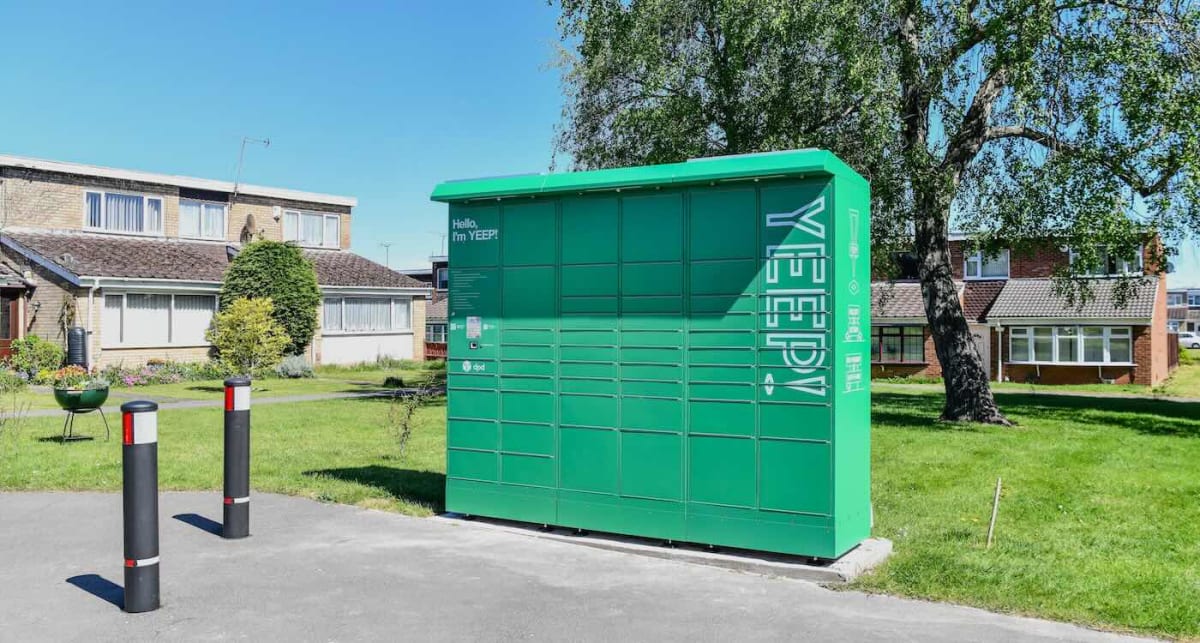 Bright green Yeep parcel locker standing in quiet residential cul-de-sac in Coventry England