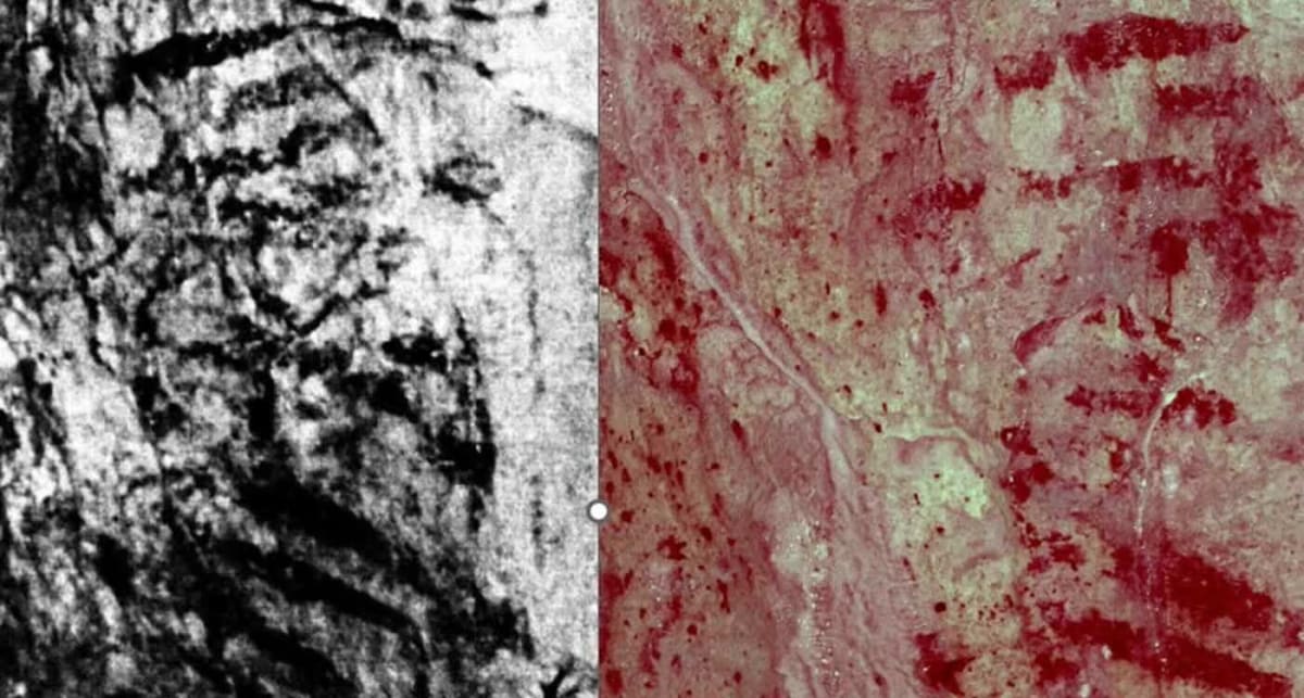 Ancient red painted stripes on limestone cave wall in Wales' Bacon Cave