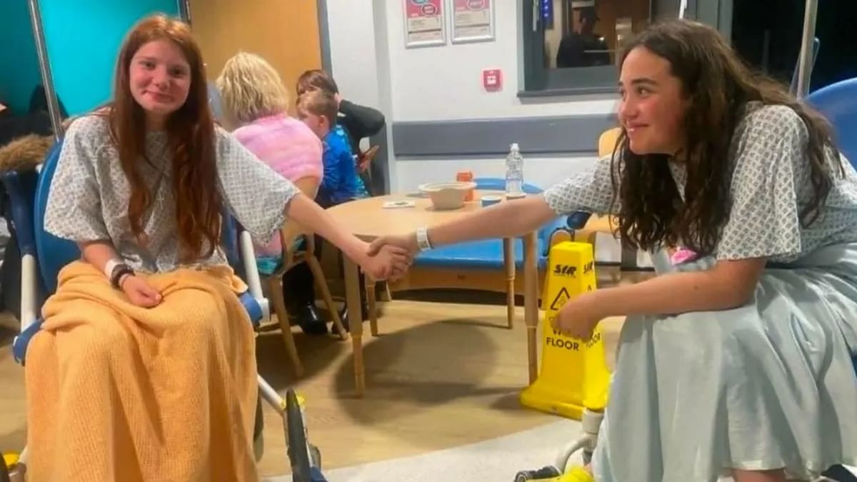 Tamika and Sofia-Ann smiling together after the dramatic beach rescue in Wales