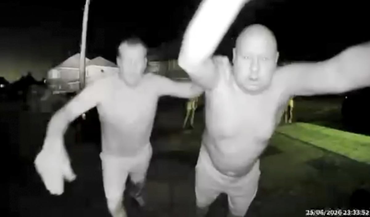 Doorbell camera footage shows neighbors gathering outside burning home to rescue elderly woman
