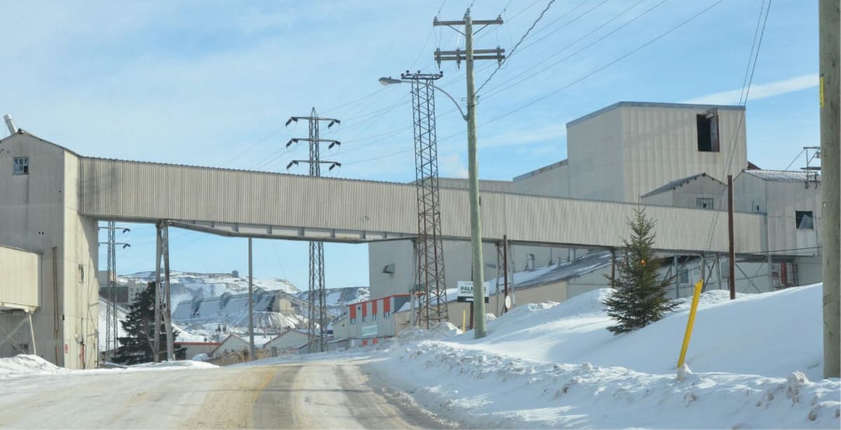 Industrial chemical processing plant equipment at Thetford Mines facility testing sustainable gold extraction technology