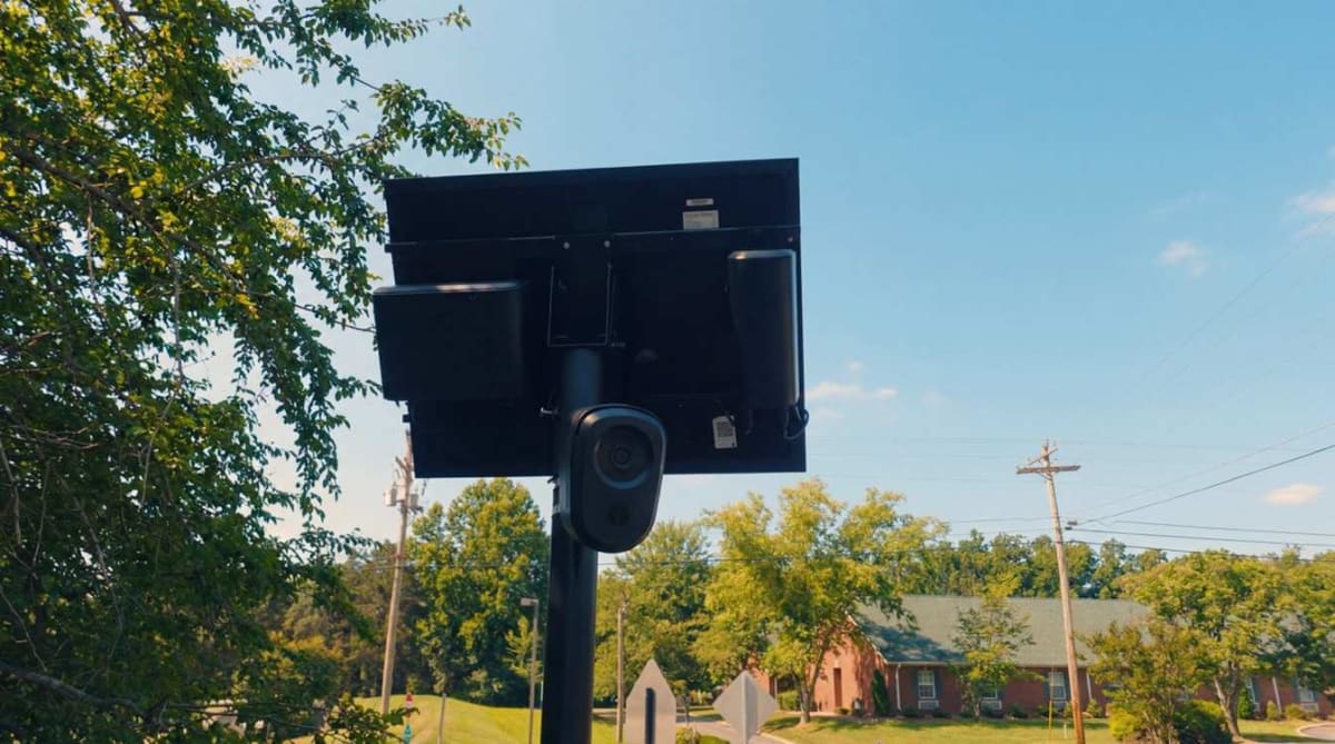 Solar-powered Flock Safety automated license plate reader camera mounted on street pole