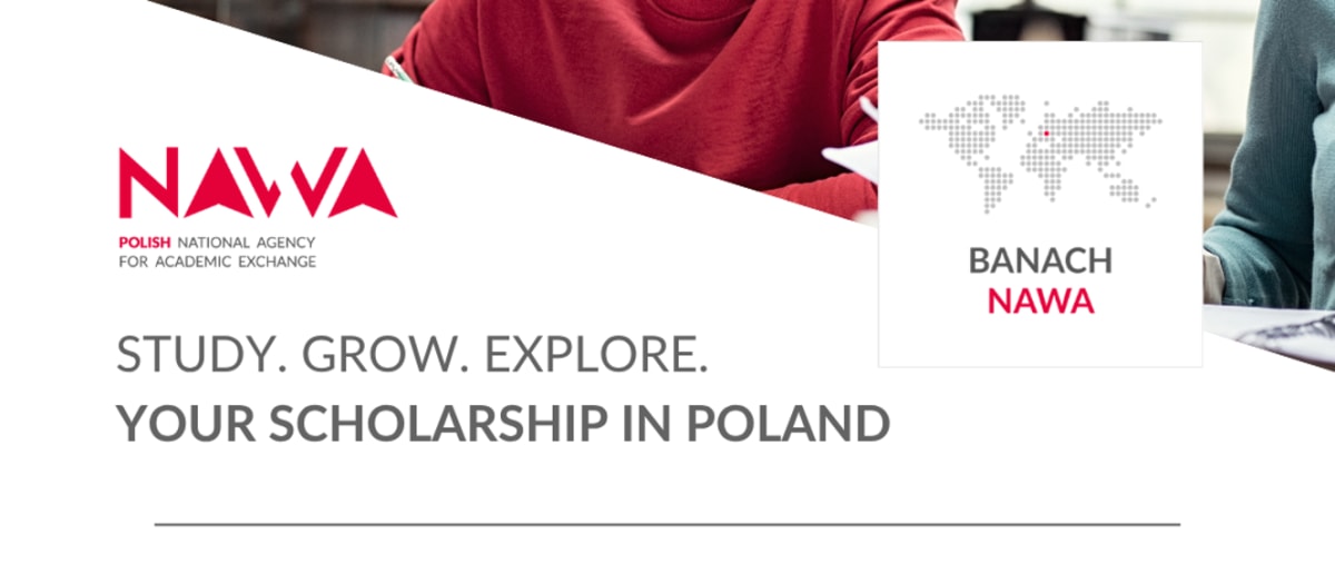 Tanzanian student holding acceptance letter in front of historic Polish university building