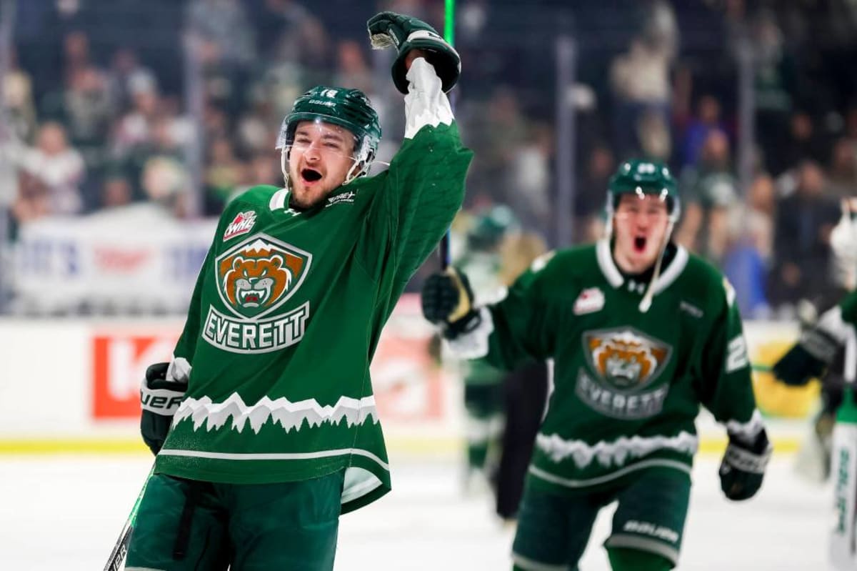 Everett Silvertips hockey players celebrating their first WHL Championship victory on ice