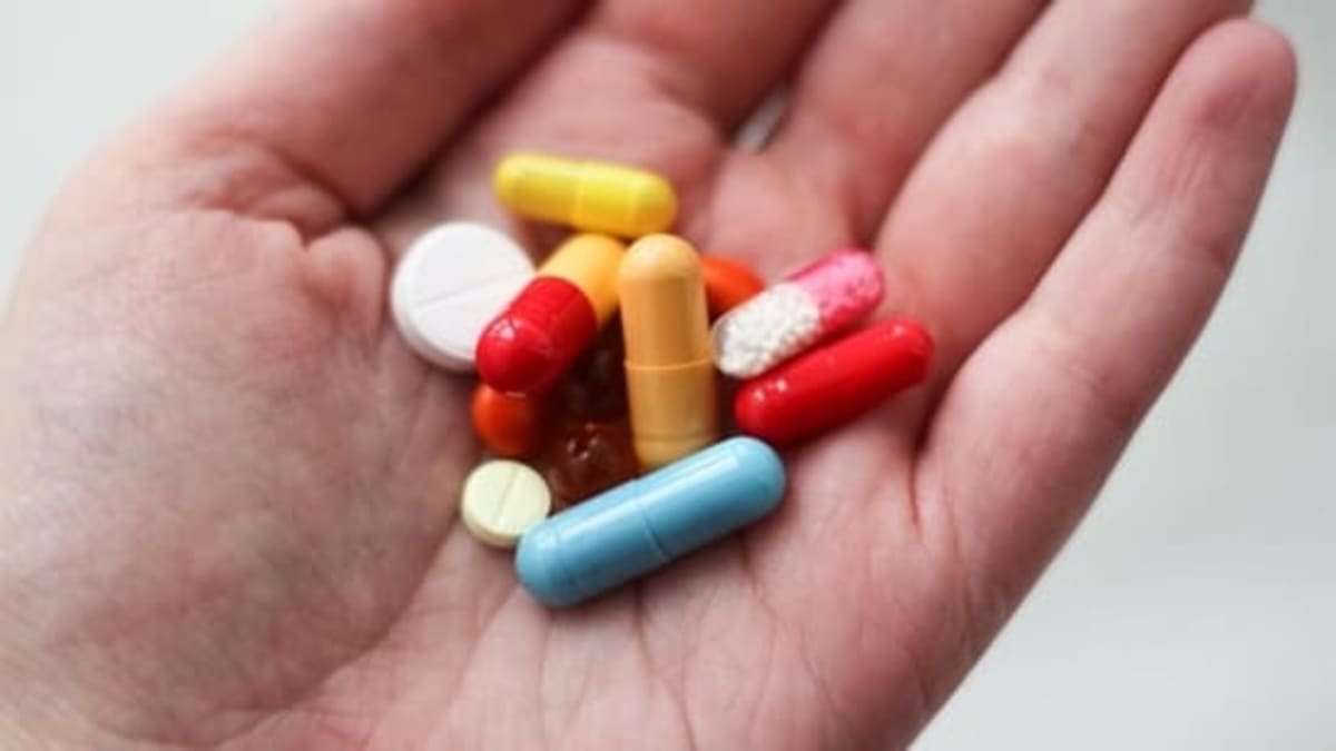 Rows of affordable generic medicine bottles in Indian pharmaceutical manufacturing facility
