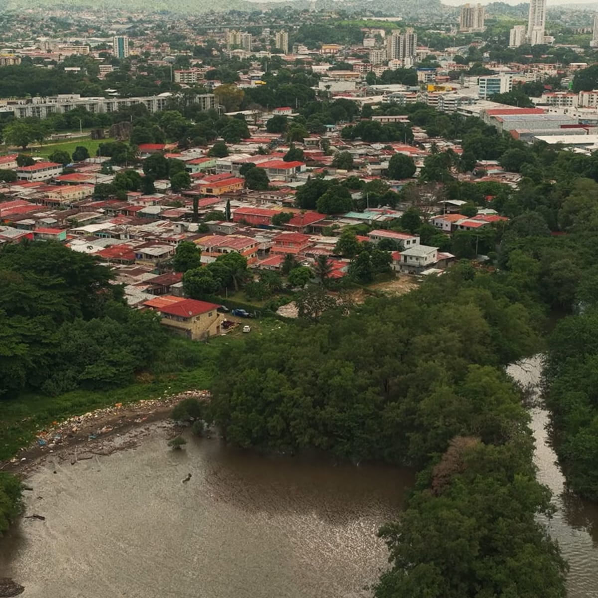 ** Solar-powered Interceptor device collecting plastic waste from Panama City river before it reaches ocean