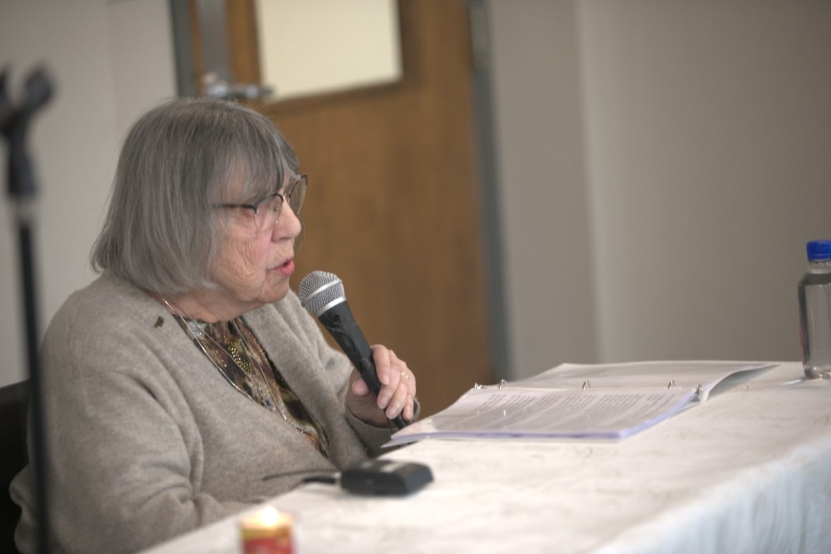 Holocaust survivor Erika Schwartz speaking to packed audience at Springfield Illinois community center