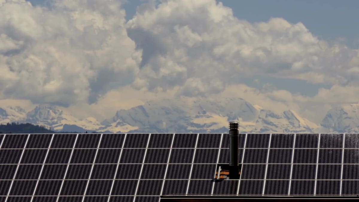 Solar panels installed on residential rooftops in Germany generating clean renewable energy
