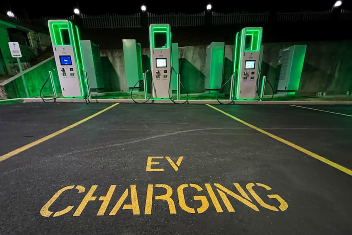 Electric vehicle charging station on Philadelphia street with cars plugged in