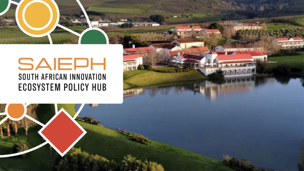 Diverse group of South African innovators and entrepreneurs collaborating at technology hub launch event