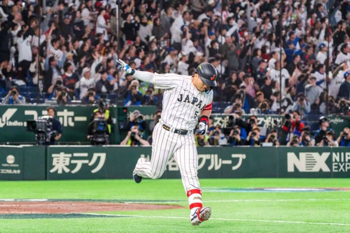 Baseball players competing at Tokyo Dome during World Baseball Classic rivalry game