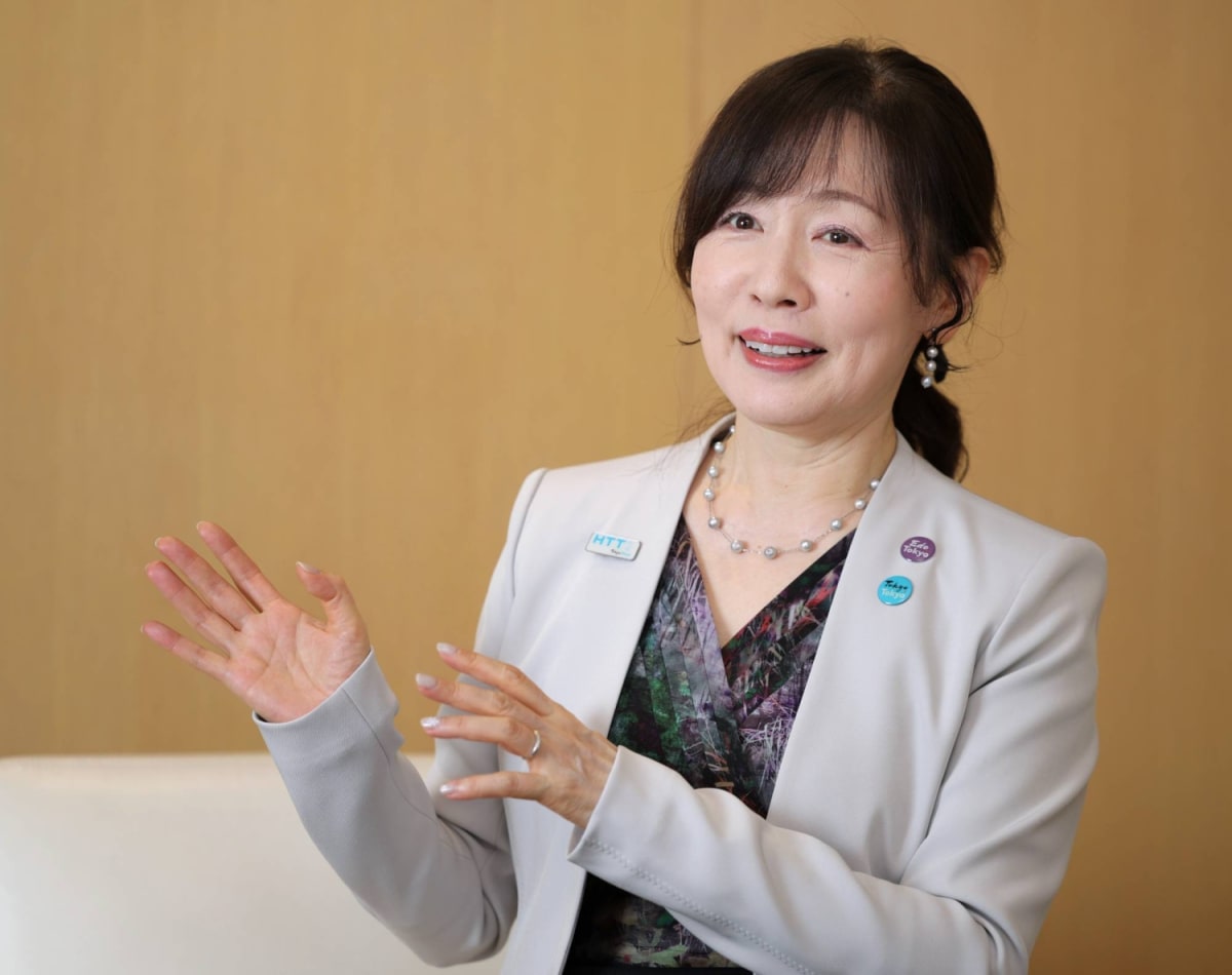 Two female Japanese government leaders speaking about workplace equality and progress