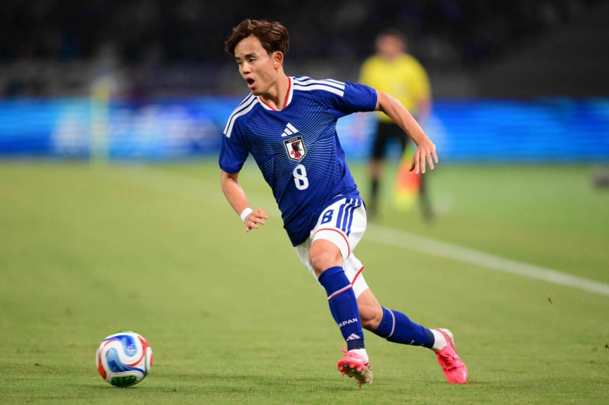 Japanese soccer player Koki Ogawa celebrates after scoring late winning goal against Iceland