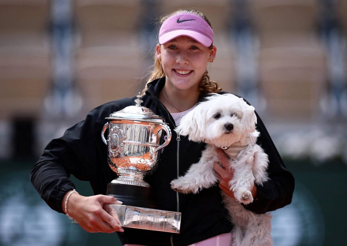 Mirra Andreeva holding French Open trophy after winning championship in Paris at age 19