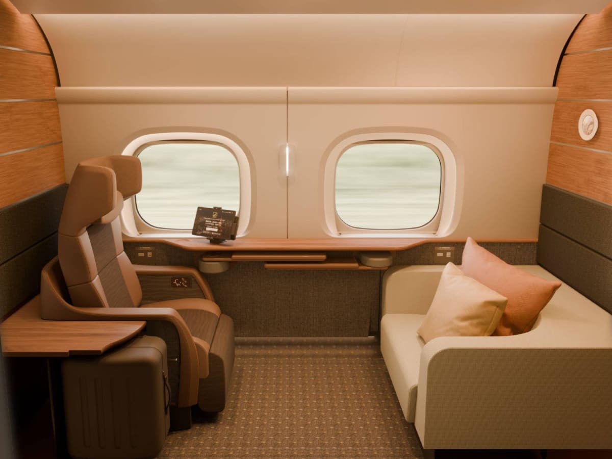 Modern Japanese bullet train interior showing private luxury compartment with reclining seats