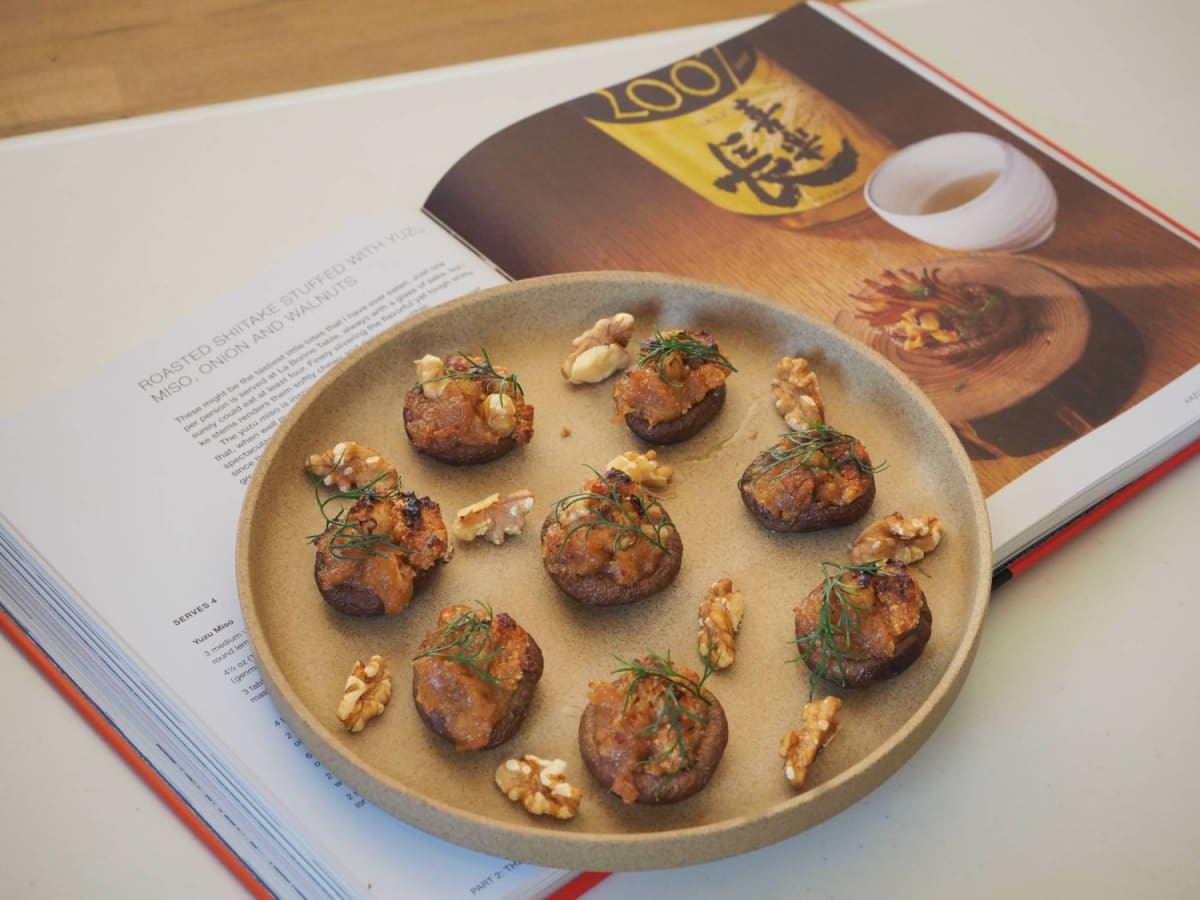 Cookbook author Nancy Singleton Hachisu preparing traditional Japanese dishes in rustic kitchen setting