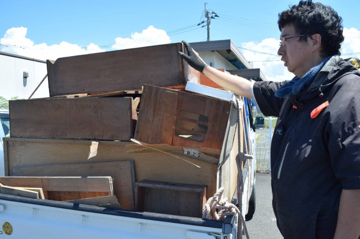 Volunteers from Japan Car Sharing Association preparing vehicles for disaster relief distribution