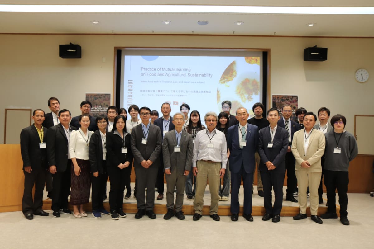** Researchers examining cricket farming facilities at Khon Kaen University sustainability innovation center