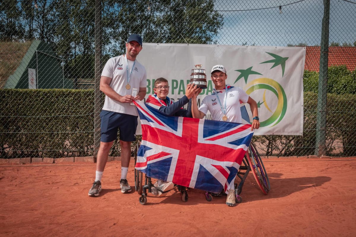 Two British teenage wheelchair tennis players celebrating their historic World Team Cup victory in Belgium
