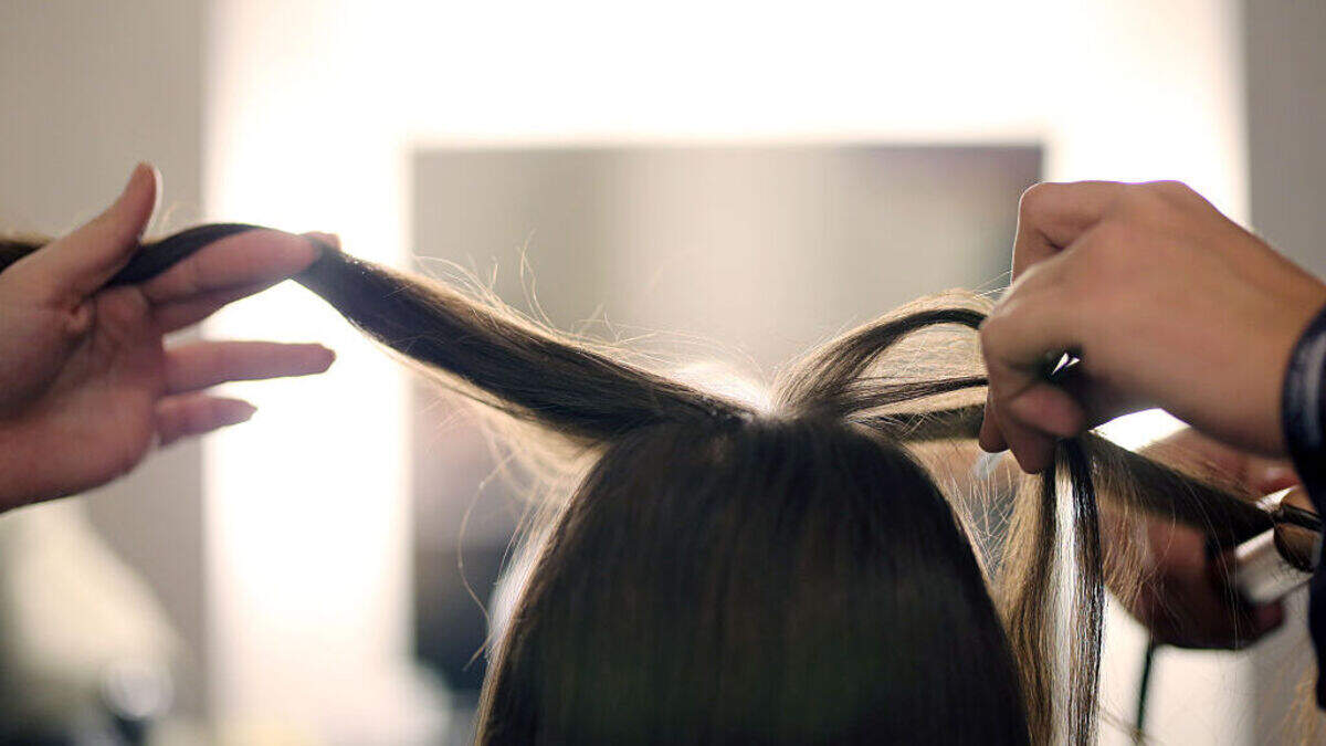 Close-up of healthy hair growth showing regrowth progress from new treatment options