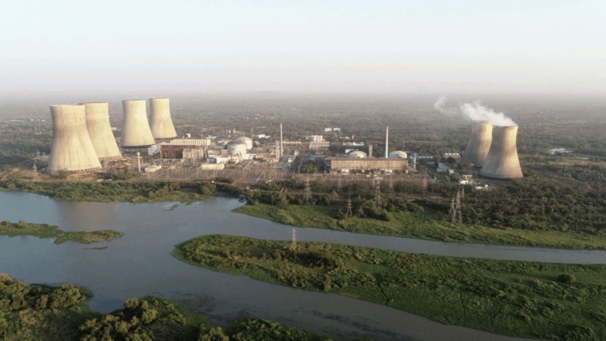 Modern nuclear research facility in India with scientists working on small modular reactor technology