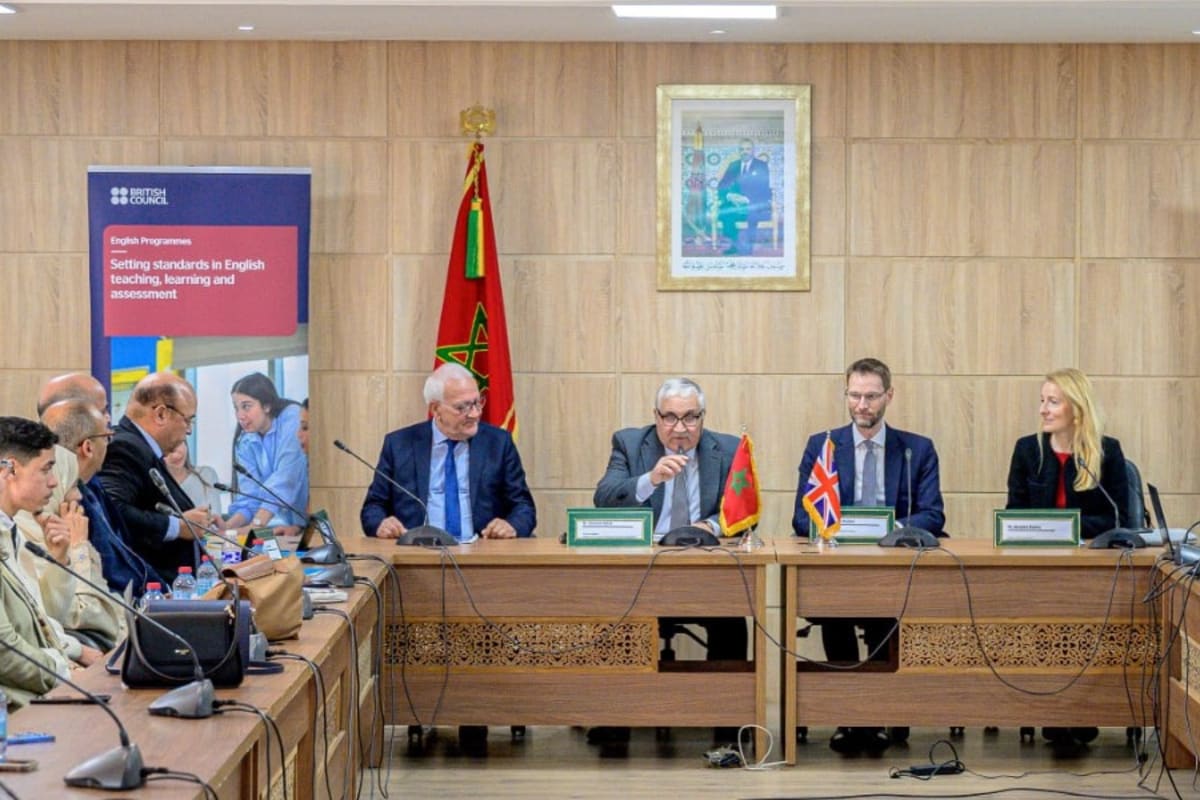 Moroccan teachers celebrating graduation from English language teaching training program in Rabat ceremony