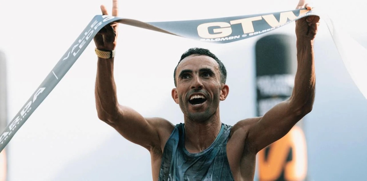 Moroccan mountain runner El Houcine El Azzaoui competing on steep mountain trail during world record race