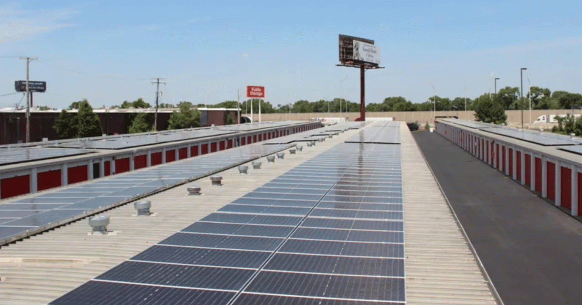 Solar panels covering the flat rooftop of a Public Storage facility in Justice, Illinois