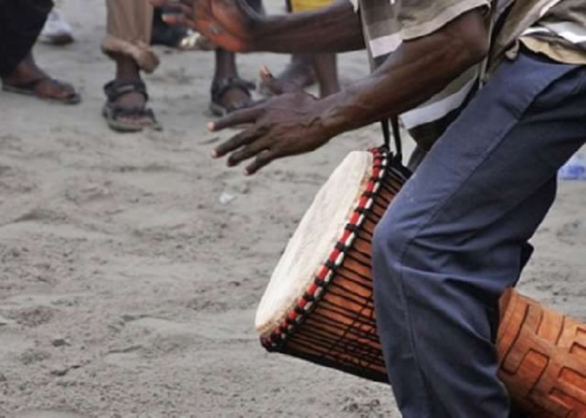 Peaceful street scene in Accra, Ghana showing quiet community during traditional Nmaa Dumo sacred observance period