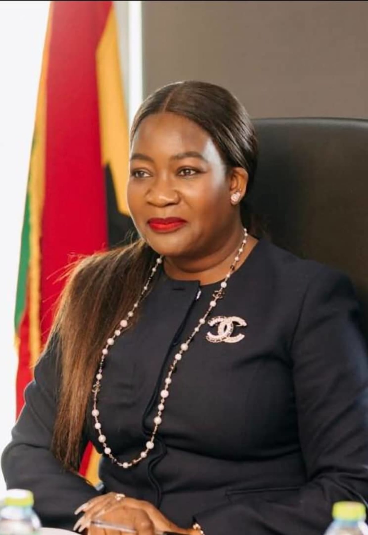 Ghana's Chief Executive Justina Nelson presenting mineral revenue records at Accra program