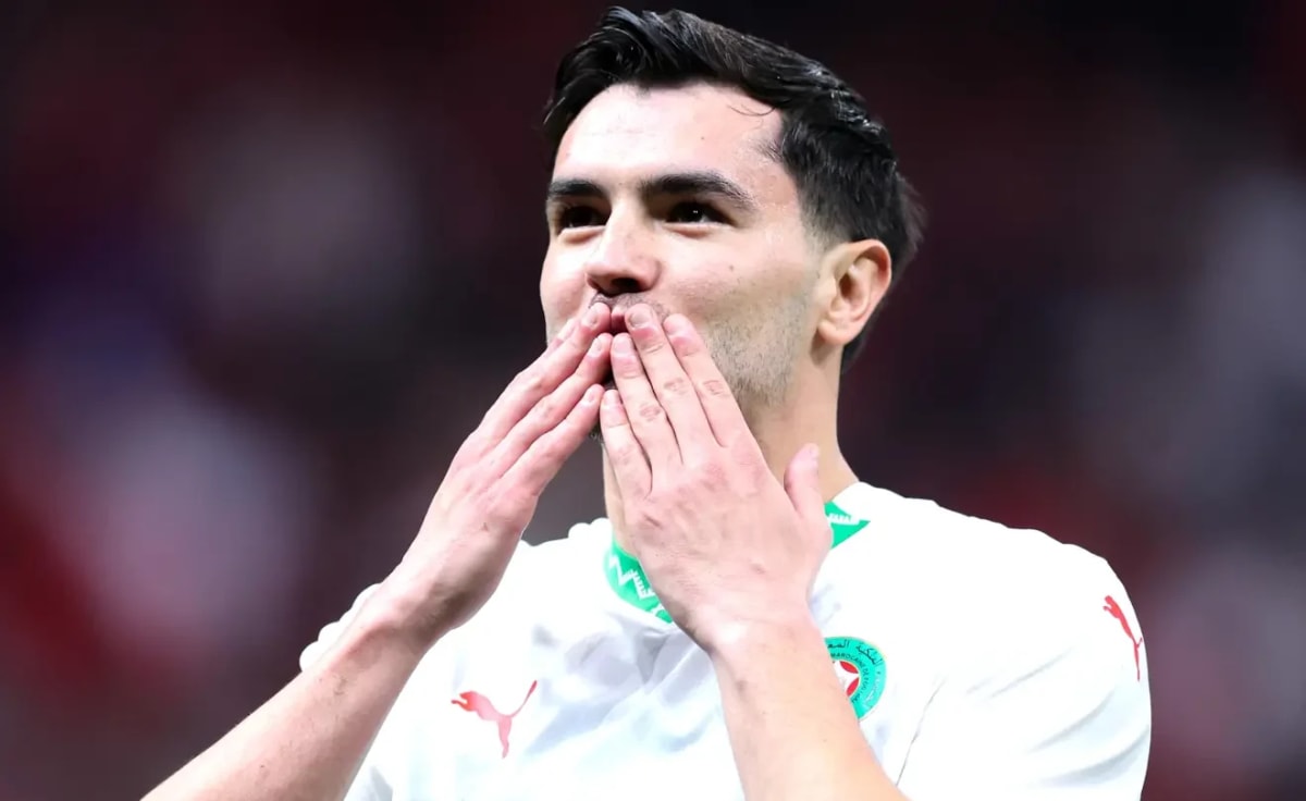 Brahim Diaz in Morocco jersey celebrating with teammates after World Cup victory