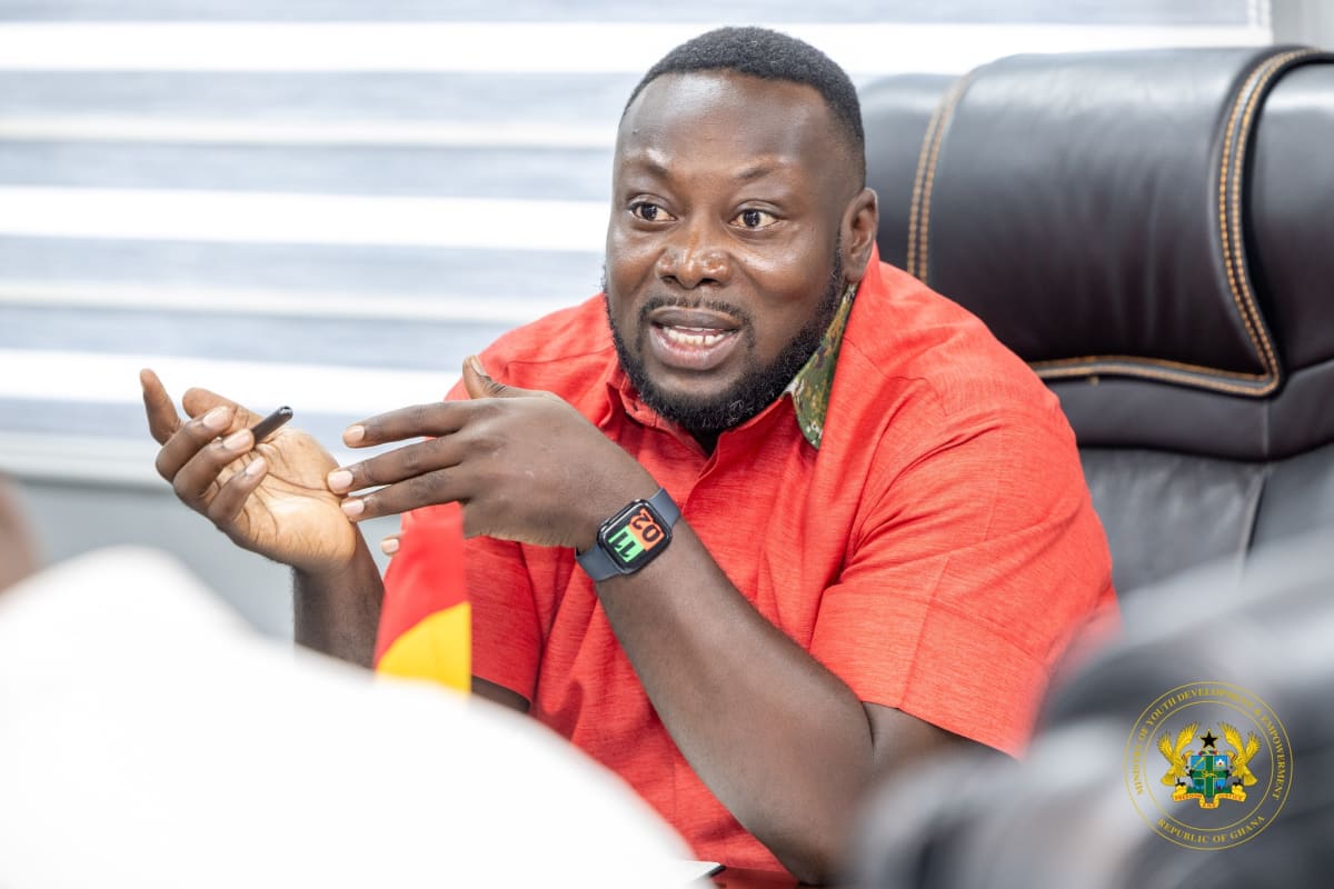 Young Ghanaian workers in care services sector helping elderly and families