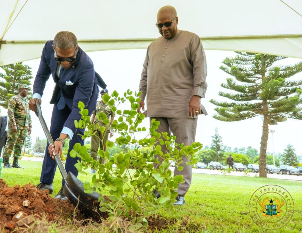 President Mahama and Prime Minister Drew planting tree together at Ghana's Presidential Gardens