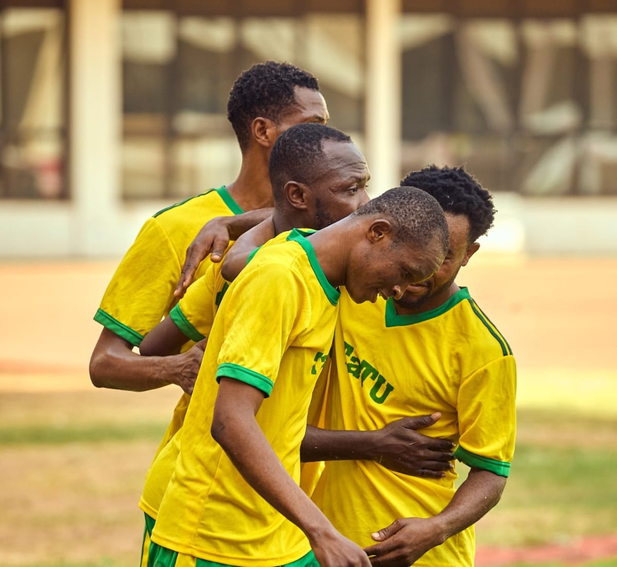 TaTU football players celebrating their first championship win on home field