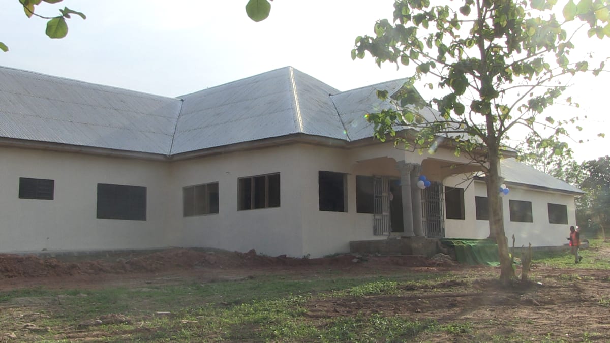 New modern health center building in Nkwakwanua Ghana with clean white exterior and proper infrastructure