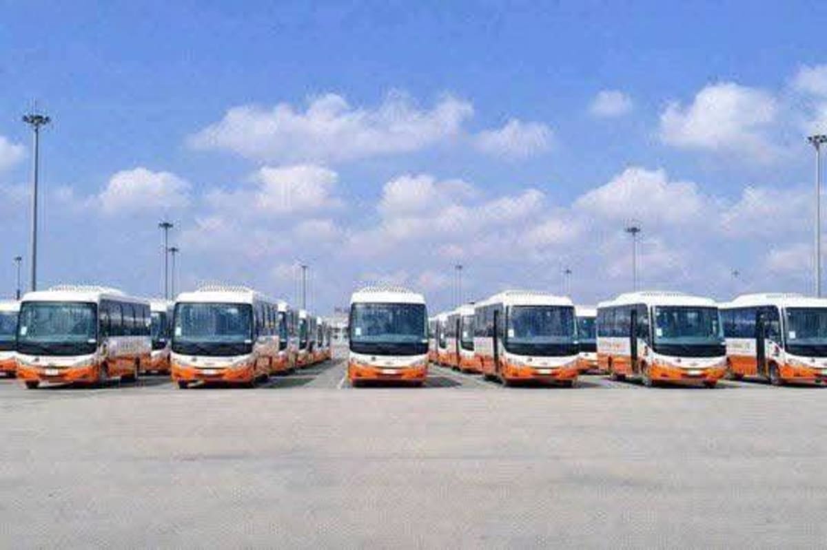 New public transport buses lined up ready to serve commuters in Ghana